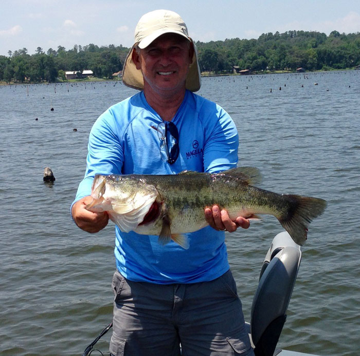 Ron with 24 inch bass at Houston County in July 2013.