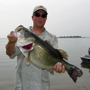 Dwayne with monster bass; 25.5" long, 12 lb 6 oz; May 2008 from Choke Canyon.